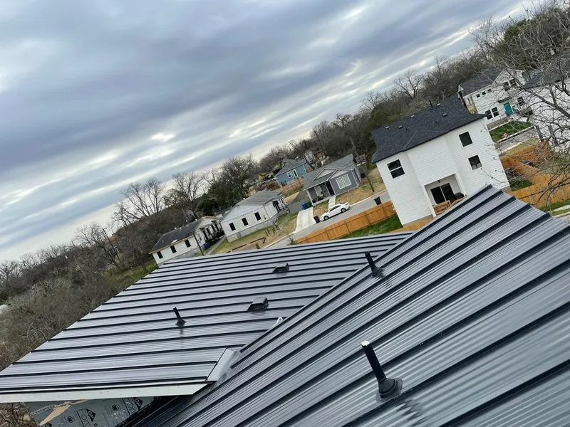 Standing seam metal roof panels with vents for Skylight Repair in Marietta